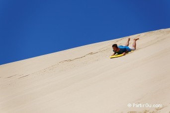 Surf sur les dunes de Te Paki Giant Sand Dunes - Nouvelle-Zélande